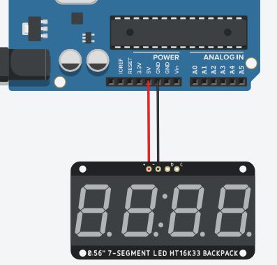 Passo 2 - Conectar um jumper wire no 5v do arduino até a porta positiva do display 7 segmentos